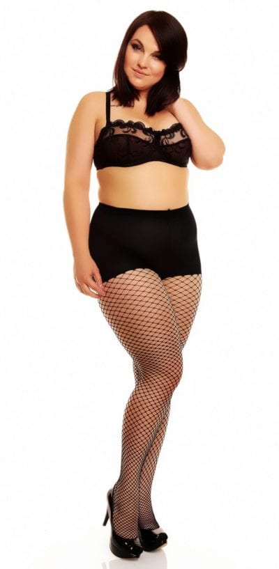 Plus size model wearing Glamory mesh fishnet tights front veiw